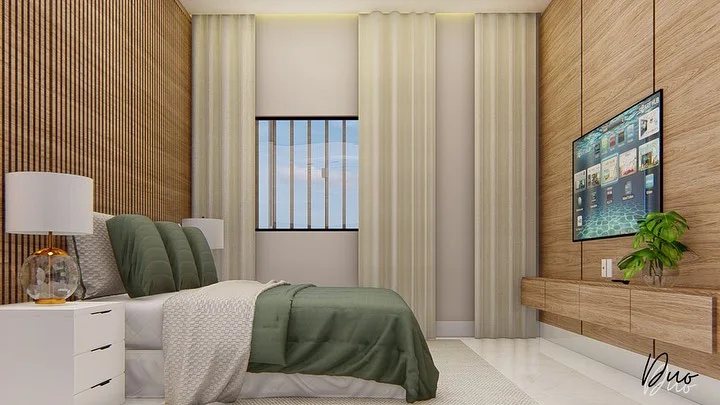 Quarto com cabeceira de madeira e tons verdes